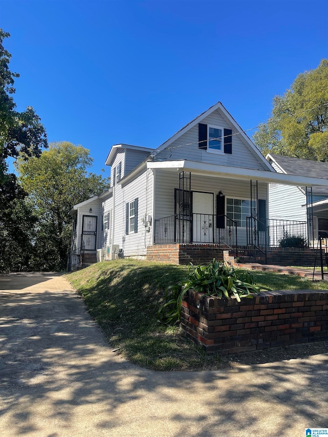 bungalow-style home with a porch