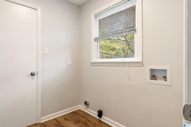 washroom with washer hookup and hardwood / wood-style flooring