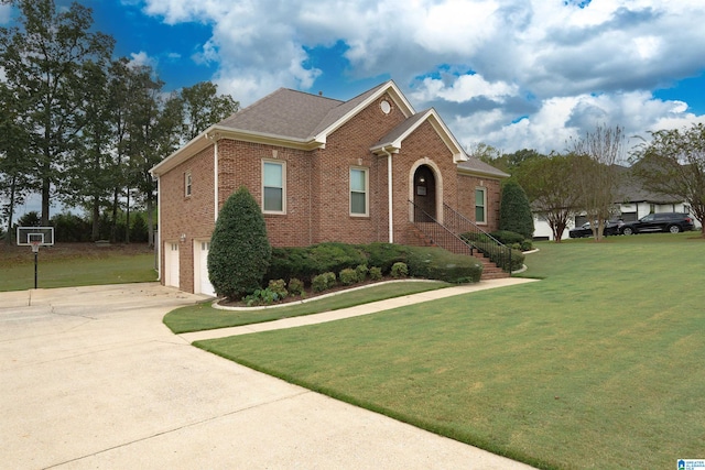 view of front of property featuring a garage and a front lawn