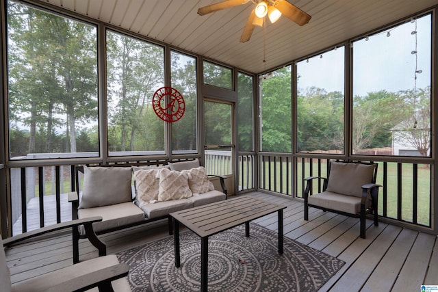 sunroom / solarium with ceiling fan