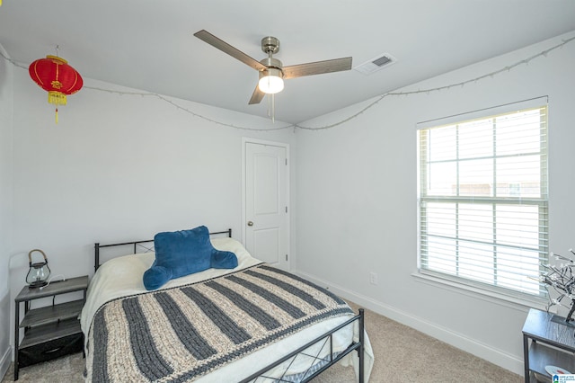 carpeted bedroom featuring ceiling fan