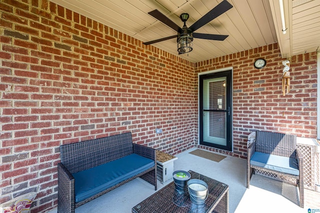 view of patio featuring ceiling fan