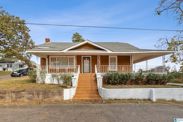 farmhouse-style home featuring a porch