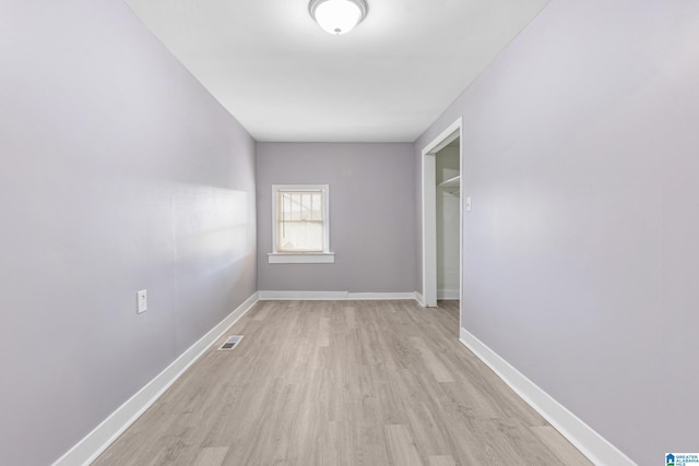 empty room featuring light hardwood / wood-style floors