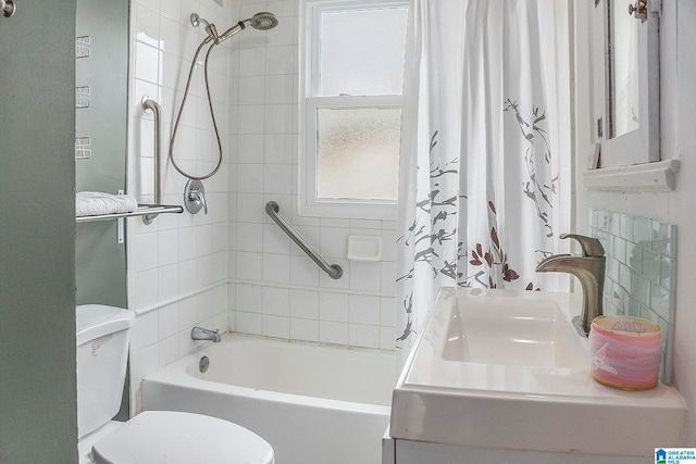 full bathroom featuring toilet, sink, and shower / tub combo