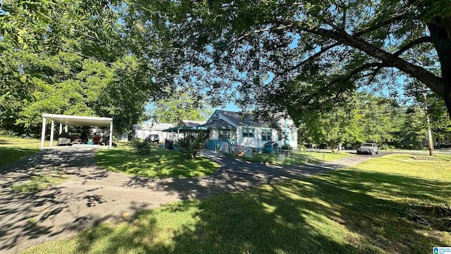 view of yard with a carport