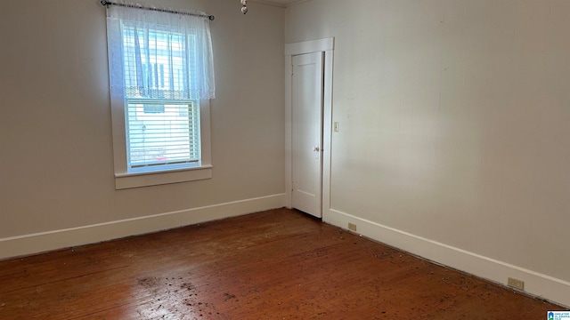 unfurnished room featuring wood-type flooring