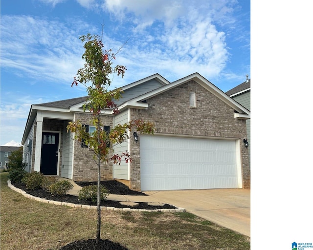 view of front of house with a garage and a front yard