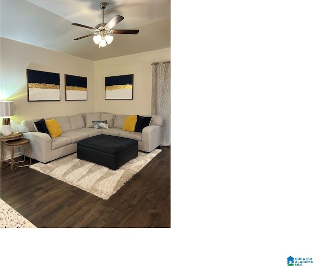 living room featuring hardwood / wood-style flooring and ceiling fan