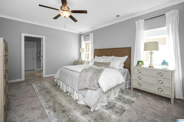 bedroom with multiple windows, ceiling fan, light colored carpet, and ornamental molding