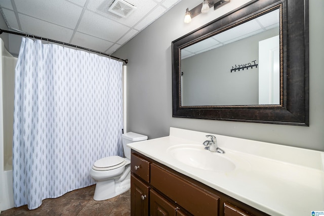 full bathroom with vanity, a paneled ceiling, toilet, and shower / bath combination with curtain