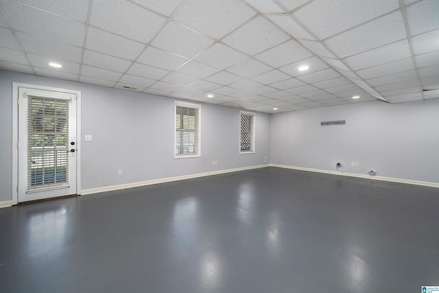 basement featuring a drop ceiling