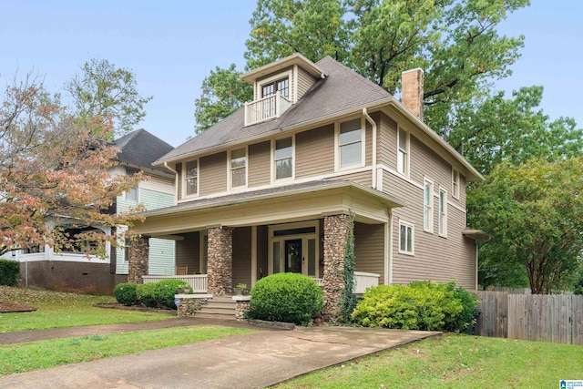 view of front of house featuring a front lawn and a porch