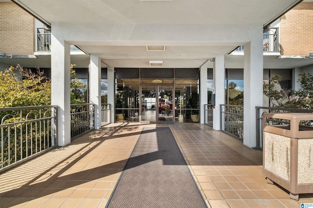 view of patio featuring a balcony