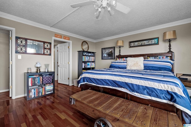 bedroom featuring dark hardwood / wood-style flooring, ornamental molding, a textured ceiling, and ceiling fan