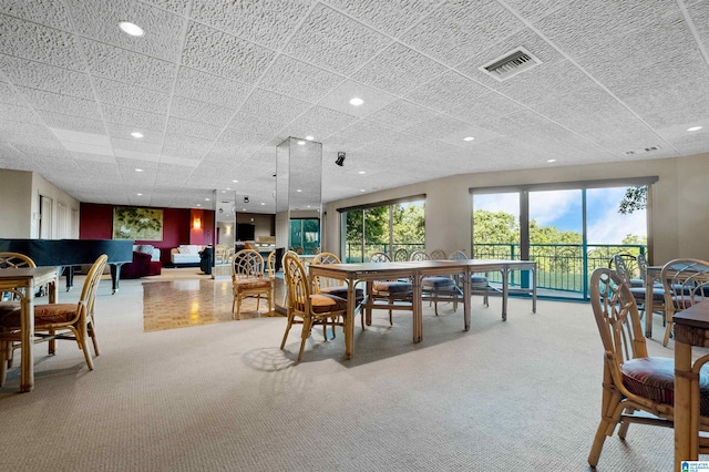 view of carpeted dining space