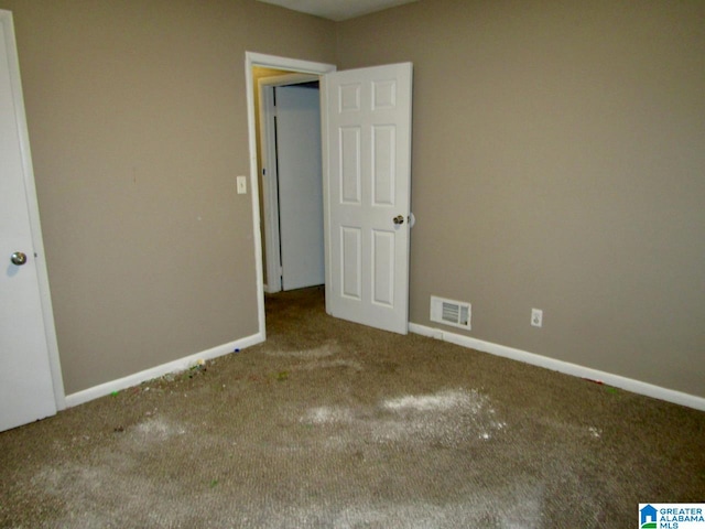 unfurnished bedroom with carpet