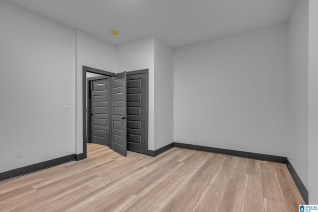 1174 Ranch Marina Rd, Pell City, AL 35128 - unfurnished bedroom with light wood finished floors and baseboards