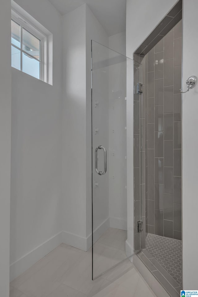 1174 Ranch Marina Rd, Pell City, AL 35128 - bathroom with a shower stall, baseboards, and tile patterned flooring