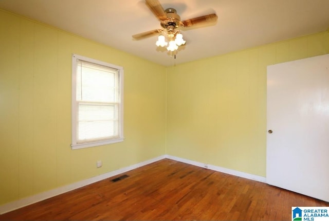 unfurnished room featuring wood-type flooring and ceiling fan