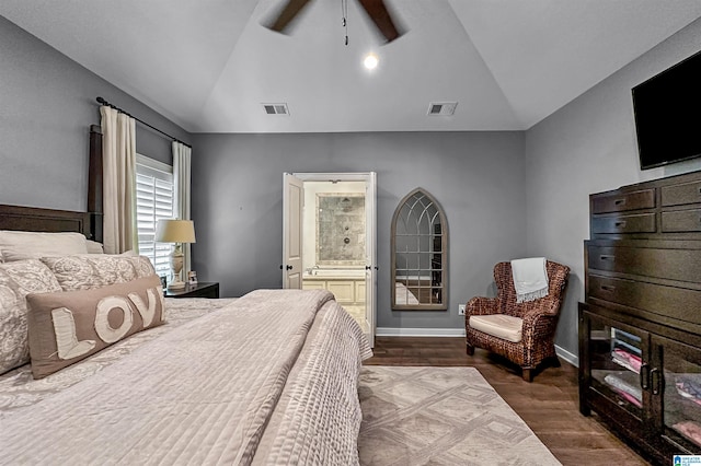 bedroom featuring hardwood / wood-style floors, ceiling fan, vaulted ceiling, and connected bathroom