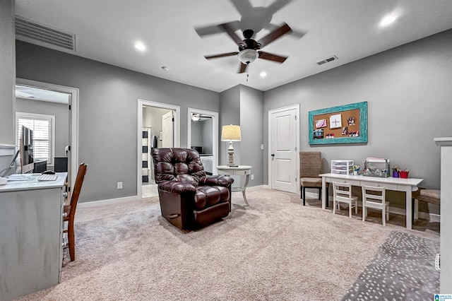 living room with carpet floors and ceiling fan