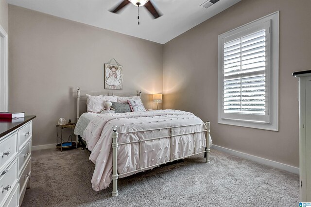 carpeted bedroom with ceiling fan