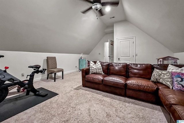 interior space with lofted ceiling, light colored carpet, and ceiling fan