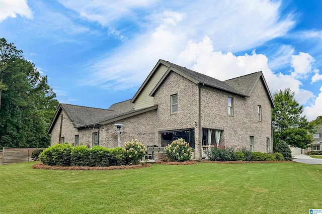 view of property exterior featuring a yard