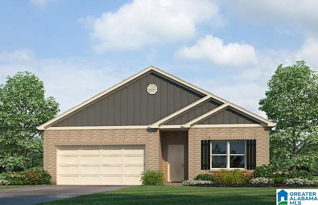 view of front of house featuring a garage and a front yard