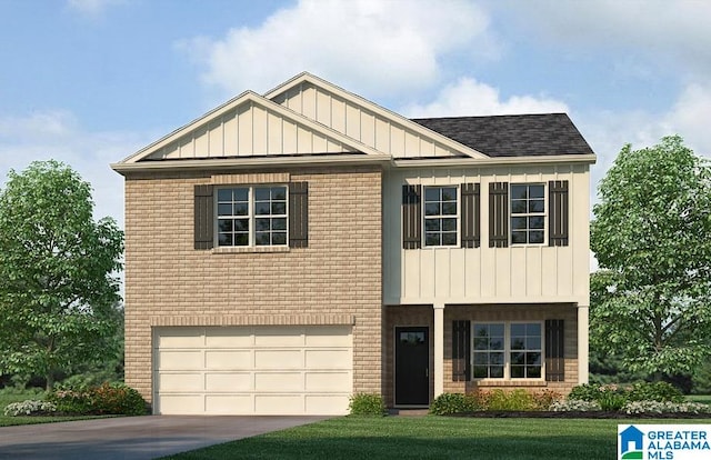 craftsman house featuring a garage and a front yard