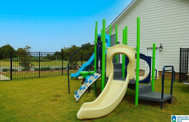 view of jungle gym featuring a yard