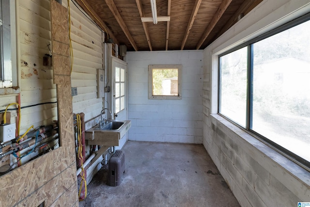 unfurnished sunroom featuring sink