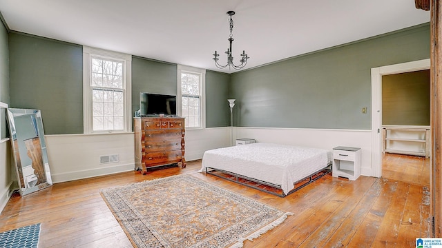 bedroom featuring hardwood / wood-style flooring