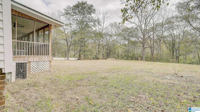 view of yard featuring a sunroom