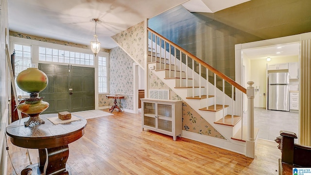 foyer with hardwood / wood-style flooring