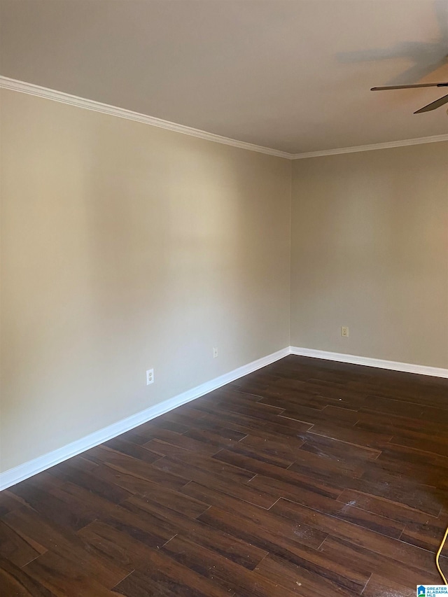 unfurnished room with dark hardwood / wood-style flooring and ornamental molding