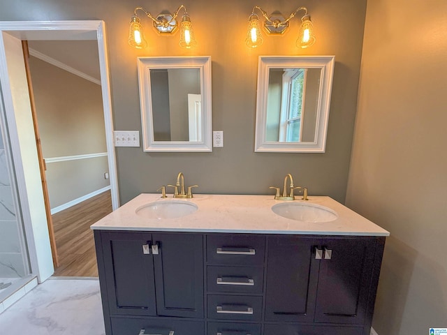 bathroom featuring vanity and ornamental molding