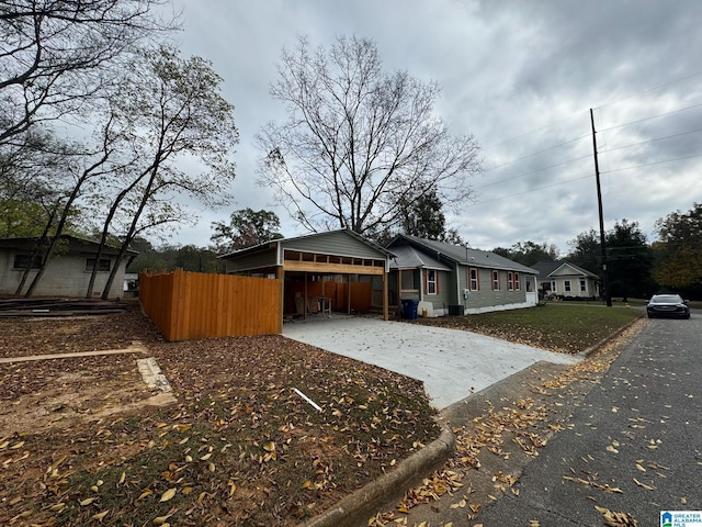 view of front of property with a carport