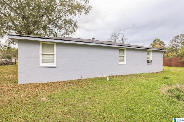 view of property exterior featuring a yard