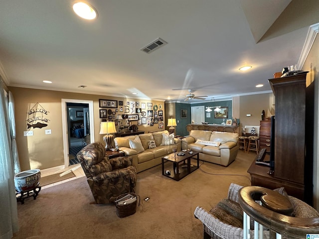 living room featuring ornamental molding, carpet flooring, and ceiling fan