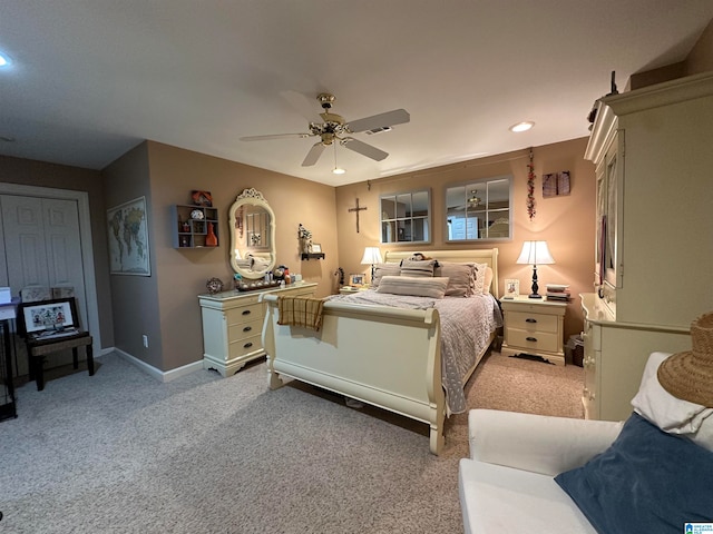 carpeted bedroom with ceiling fan