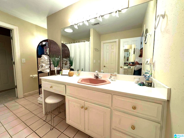 bathroom featuring vanity and tile patterned floors