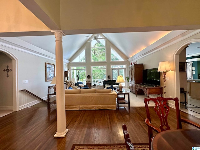 living room with lofted ceiling, wood-type flooring, and ceiling fan