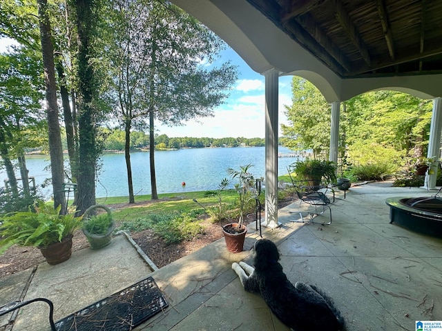 view of patio / terrace featuring a water view