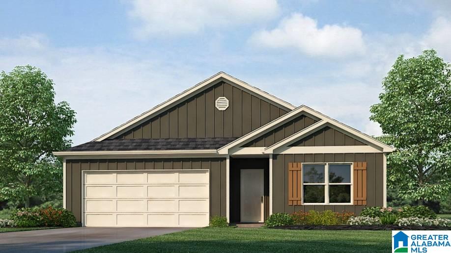 view of front facade with a garage and a front yard