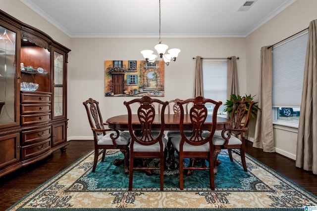 dining room with a chandelier, dark hardwood / wood-style flooring, and crown molding