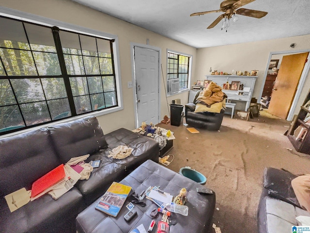 carpeted living room with ceiling fan and cooling unit