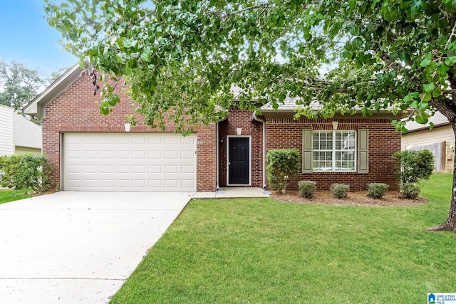 ranch-style house featuring a garage and a front lawn