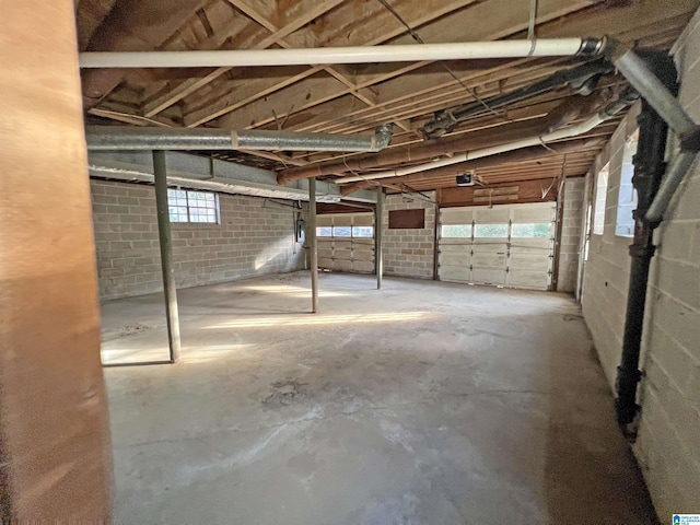 garage with concrete block wall